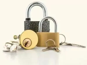 a bunch of keys and some padlocks